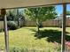 Spacious backyard with mature trees and a grassy lawn at 190 W 1St Ave, Broomfield, CO 80020