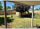 Backyard with grassy area, shed, and privacy fence at 190 W 1St Ave, Broomfield, CO 80020