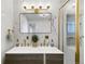 Stylish bathroom with double sinks and gold fixtures at 190 W 1St Ave, Broomfield, CO 80020