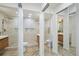 Double vanity bathroom with marble tile and glass shower at 190 W 1St Ave, Broomfield, CO 80020