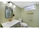 Basement bathroom with a single vanity and shower at 190 W 1St Ave, Broomfield, CO 80020