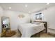 Bright bedroom with a queen bed and stylish decor at 190 W 1St Ave, Broomfield, CO 80020