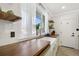 Renovated kitchen with farmhouse sink and butcher block countertops at 190 W 1St Ave, Broomfield, CO 80020