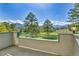 Balcony view of a mountain landscape with trees and clear skies at 31819 Rocky Village Dr # 418, Evergreen, CO 80439