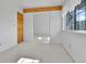 Bedroom with a window, sliding closet door and neutral carpet at 31819 Rocky Village Dr # 418, Evergreen, CO 80439