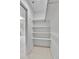 Walk-in closet with white shelving and ample storage space at 31819 Rocky Village Dr # 418, Evergreen, CO 80439