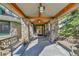 A welcoming entrance area with stone pillars, wooden beams and built-in benches for relaxing at 31819 Rocky Village Dr # 418, Evergreen, CO 80439