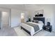 Main bedroom featuring neutral decor and doorway to bathroom at 2550 Winding River Dr # F2, Broomfield, CO 80023