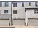 Modern townhome featuring a 3-car garage at 1330 Independence St # 2, Lakewood, CO 80215