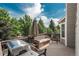 Well-kept deck with a stainless grill and patio furniture perfect for entertaining at 14170 W Warren Dr, Lakewood, CO 80228