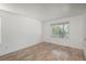 Bright living room with hard surface floors and natural light, offering versatility for furniture arrangement and decor at 14170 W Warren Dr, Lakewood, CO 80228