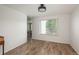 Bright living room with hard surface floors and natural light, offering versatility for furniture arrangement and decor at 14170 W Warren Dr, Lakewood, CO 80228