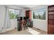 This office features a window view, and built-in shelves at 14170 W Warren Dr, Lakewood, CO 80228