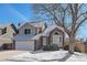 Charming two-story home with attached garage, brick accents and a well-maintained lawn at 7246 S Pierson St, Littleton, CO 80127