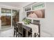 Kitchen dining area with sliding glass doors leading to the backyard at 383 S Vaughn Way, Aurora, CO 80012