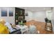 Living room with hardwood floors, fireplace and large windows at 383 S Vaughn Way, Aurora, CO 80012