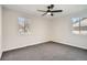 Well-lit bedroom with grey carpet and neutral walls at 2360 S Julian St, Denver, CO 80219