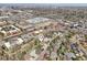 Discover the home's location in the neighborhood with this aerial view, surrounded by trees and nearby amenities at 2243 S Olive St, Denver, CO 80224