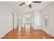 Large bedroom with closet and hardwood flooring at 2243 S Olive St, Denver, CO 80224