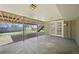 Covered patio area leading to backyard features a convenient door and staircase for easy access at 2243 S Olive St, Denver, CO 80224