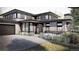 Stunning modern home with a sleek design, beautiful landscaping, and a welcoming entrance at 4852 Isabell Ct, Golden, CO 80403