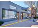 Modern commercial building featuring large windows, a sleek design, and street-level access, perfect for businesses at 2626 S Pennsylvania St, Denver, CO 80210
