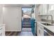 Exterior access via painted doorway and steps at 2626 S Pennsylvania St, Denver, CO 80210