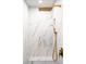 Beautiful tile shower with gold accents and shower head at 2626 S Pennsylvania St, Denver, CO 80210