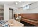 Basement featuring a piano, closet and lots of natural light from the windows at 25 S Winona Ct, Denver, CO 80219
