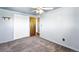 Cozy bedroom featuring a ceiling fan, closet, and neutral-toned walls for a relaxing ambiance at 25 S Winona Ct, Denver, CO 80219