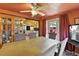 Dining room with door to patio and view to kitchen; seats six at 25 S Winona Ct, Denver, CO 80219