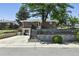 Traditional brick home with landscaped front yard, showcasing curb appeal and a welcoming entrance at 25 S Winona Ct, Denver, CO 80219