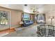 Bright living room with a comfortable blue sofa and view to the front door at 25 S Winona Ct, Denver, CO 80219