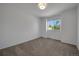 Bedroom with neutral carpet, white trim and light colored walls at 8884 Miners St, Highlands Ranch, CO 80126