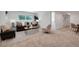 Bright living room featuring a comfortable sofa, chairs, and stylish decor at 8884 Miners St, Highlands Ranch, CO 80126