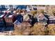 Aerial view showcases a row of charming homes with varying architectural styles, capturing a cozy neighborhood ambiance at 2335 Stout St, Denver, CO 80205