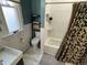 Cozy bathroom featuring a shower and tub combination with stylish decor at 2335 Stout St, Denver, CO 80205