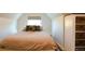 Cozy bedroom with neutral decor featuring a queen-sized bed and window at 2335 Stout St, Denver, CO 80205