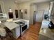 Modern kitchen with stainless steel appliances, bright countertops, and a convenient center island at 2335 Stout St, Denver, CO 80205