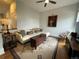 Cozy living room with a modern sofa, area rug, and a stylish wooden chest at 2335 Stout St, Denver, CO 80205