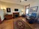 Cozy office space with hardwood floors, a fireplace, and ample natural light, ideal for remote work at 2335 Stout St, Denver, CO 80205