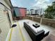 Stylish rooftop patio with lounge seating, table, chairs, and outdoor umbrella, perfect for entertaining at 2335 Stout St, Denver, CO 80205