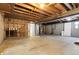 An unfinished basement with exposed ductwork and concrete walls at 5373 S Prescott St, Littleton, CO 80120
