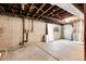 An unfinished basement with exposed ductwork and concrete walls at 5373 S Prescott St, Littleton, CO 80120