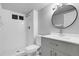 The bathroom features subway tiles in the shower and a modern vanity at 5373 S Prescott St, Littleton, CO 80120