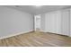 A bedroom featuring a closet and an open door to the hallway at 5373 S Prescott St, Littleton, CO 80120