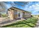 Attractive single-story home with brick accents, fresh paint, manicured lawn, and a bright, welcoming facade at 5373 S Prescott St, Littleton, CO 80120