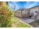 Well-maintained single-story home showcases a mix of brick and siding, with a welcoming entrance and landscaped surroundings at 5373 S Prescott St, Littleton, CO 80120