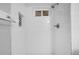 A clean shower featuring white subway tile and a shower niche at 5373 S Prescott St, Littleton, CO 80120