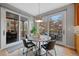 Kitchen breakfast nook with access to backyard patio at 1 Mountain Birch, Littleton, CO 80127